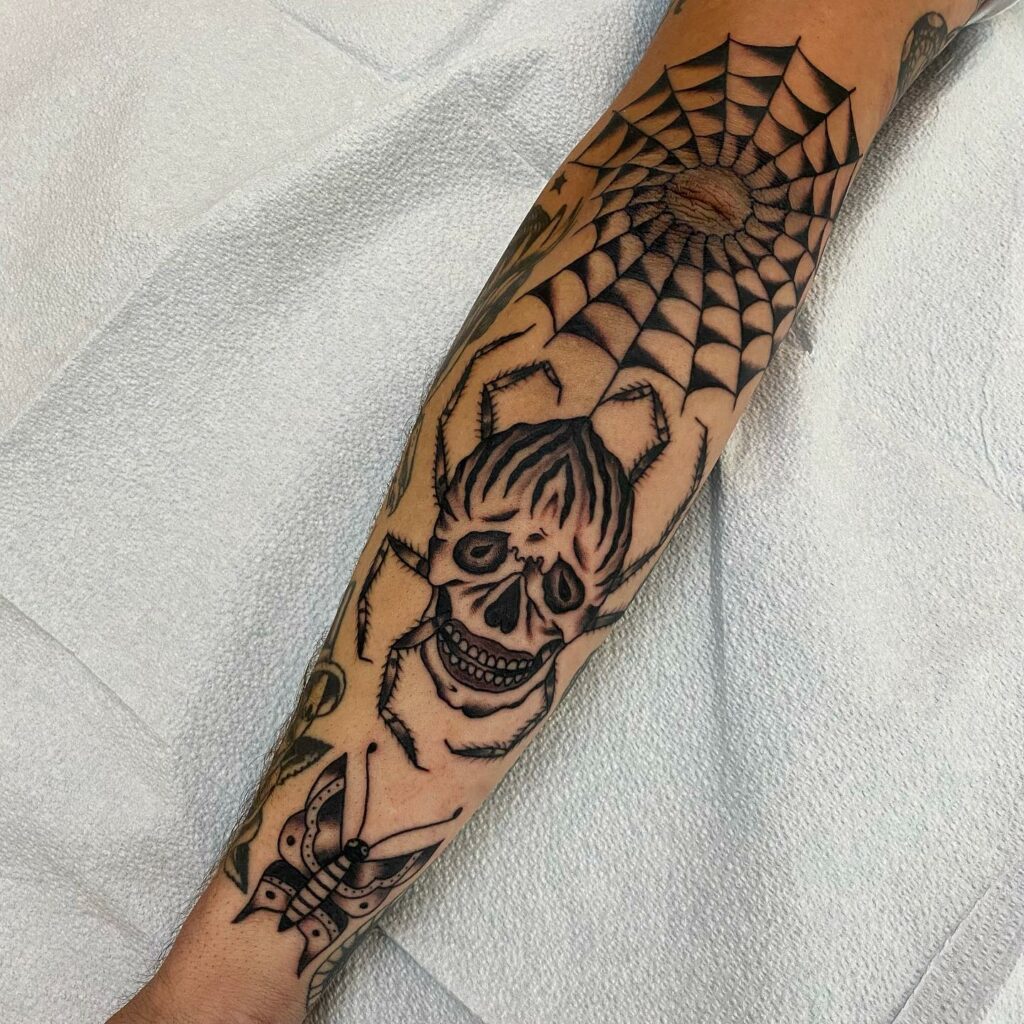 Skull Tattoo With Cobweb