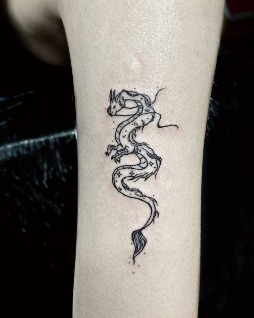 Small Dragon Hand Tattoo
