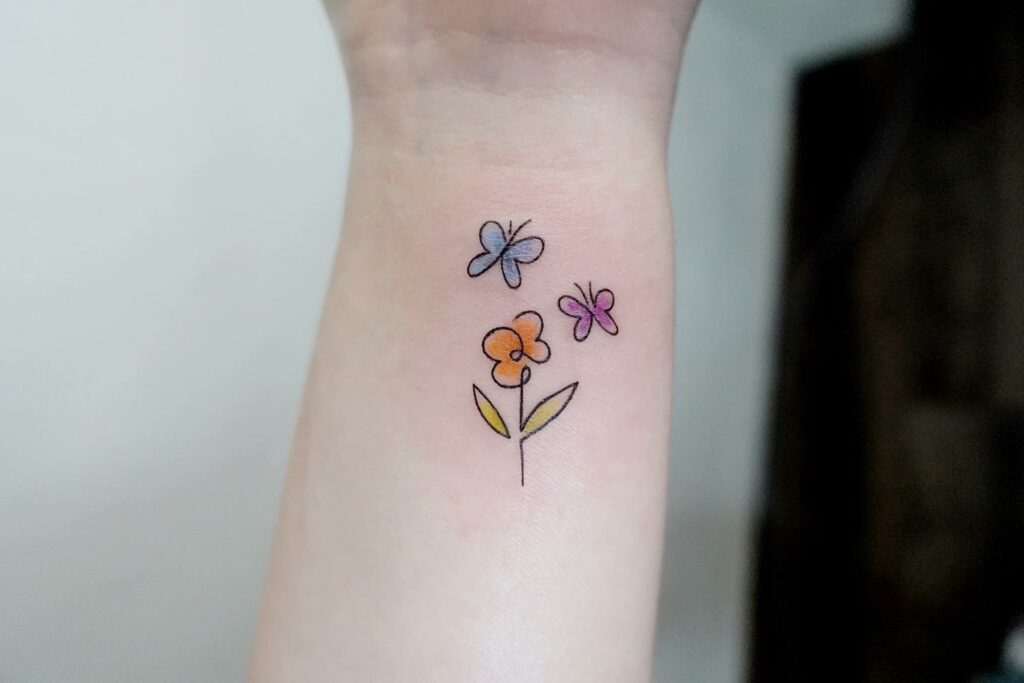 Small Flowers and Butterfly Tattoo