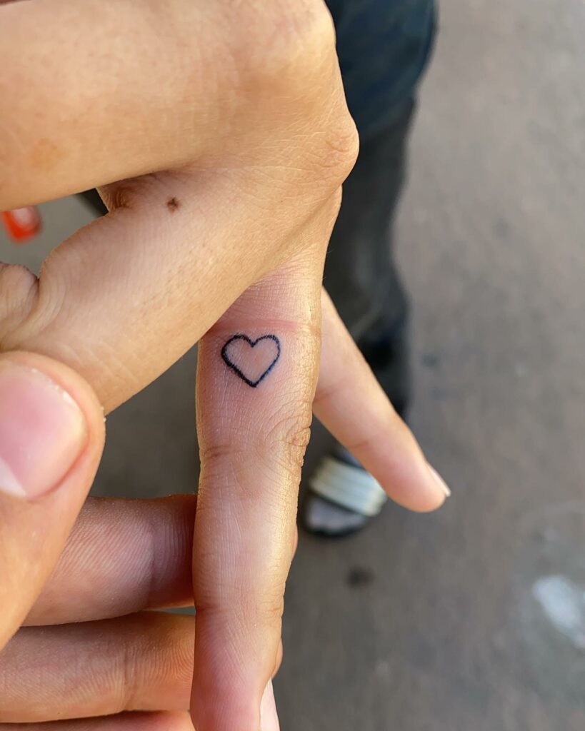 Small Heart Tattoo On Fingers