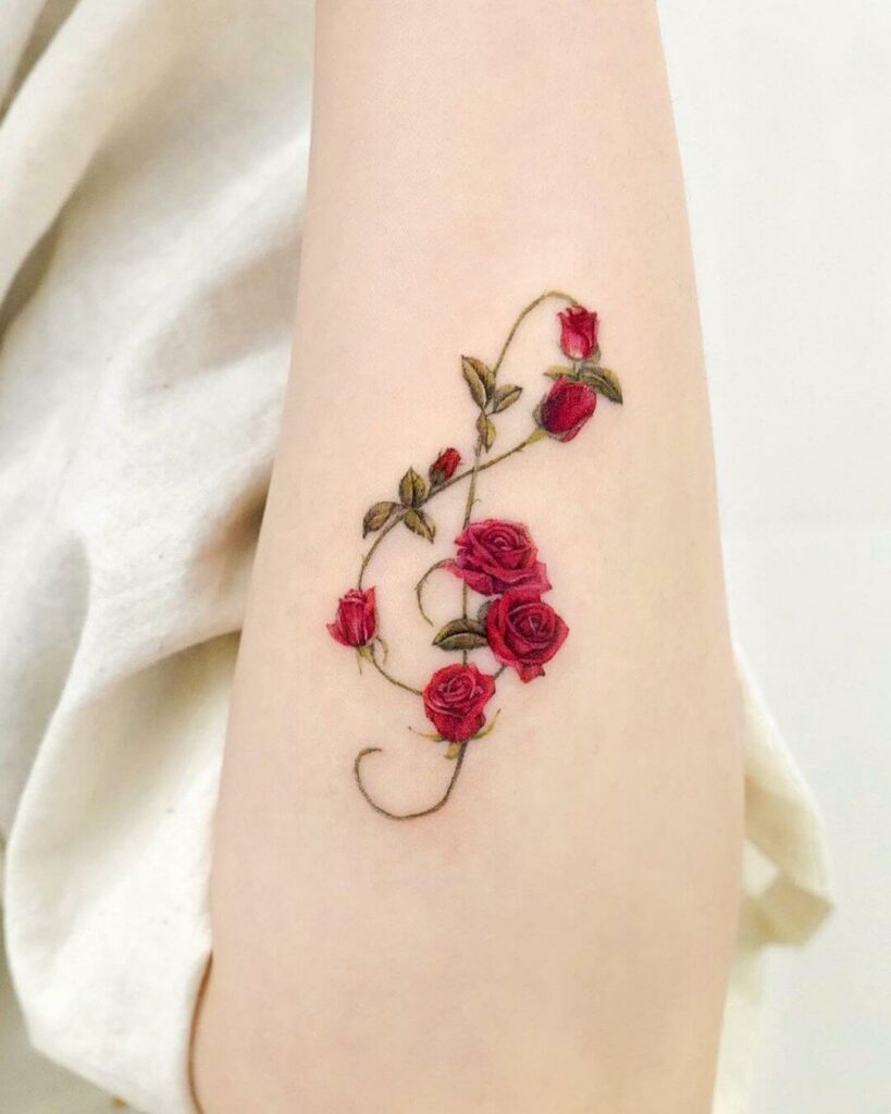 Small Rose On Hand Tattoos 