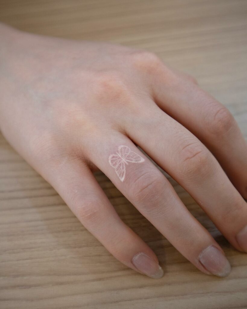 11 Mesmerizing White Ink Tattoo Ideas  Moms Got the Stuff