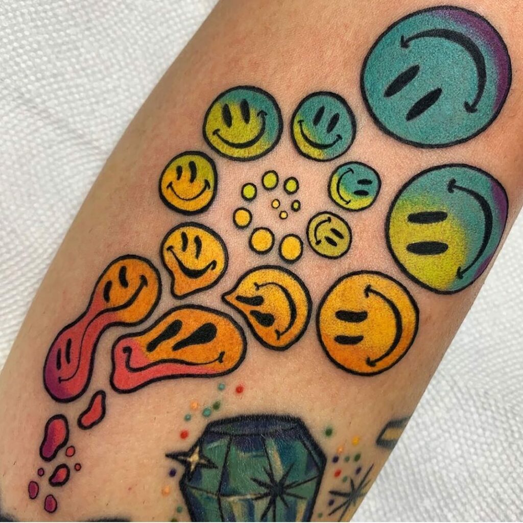 Smiley Face Tattoo In A Rainbow Color