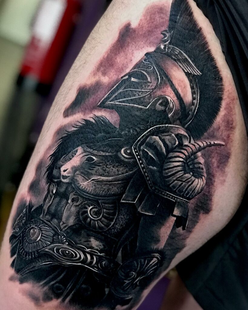 Spartan tattoo on the left upper arm, inspired by 300.