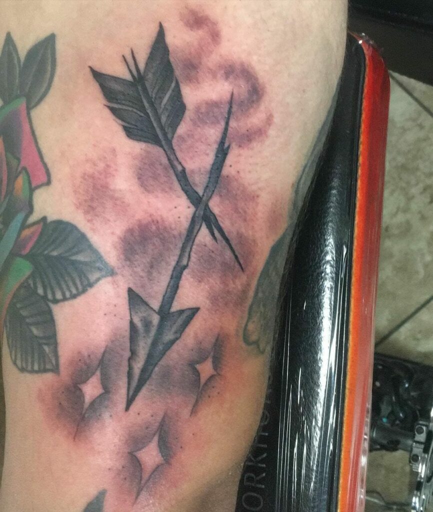 Starry Broken Arrow Tattoo