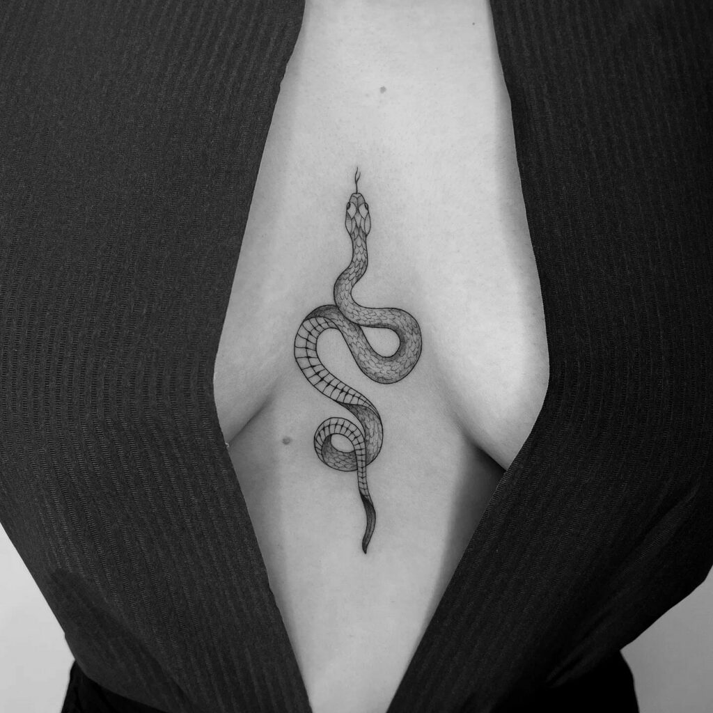 Sternum Tattoos With Snake Motif For People Who Like Dark Tattoos