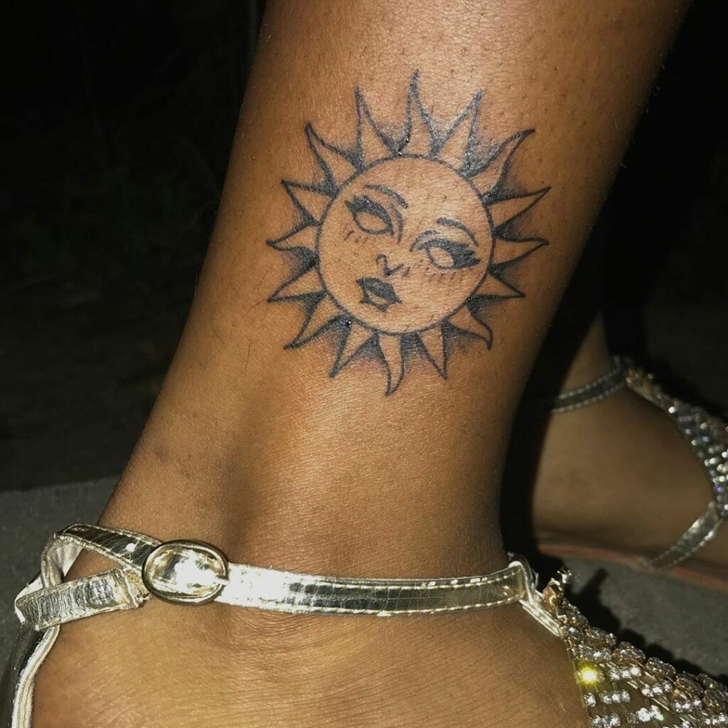Sun With Face Tattoo