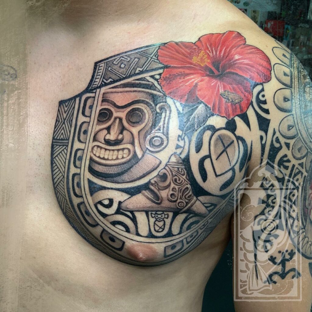 Taino Symbols And Hibiscus Chest And Sleeve Tattoo 