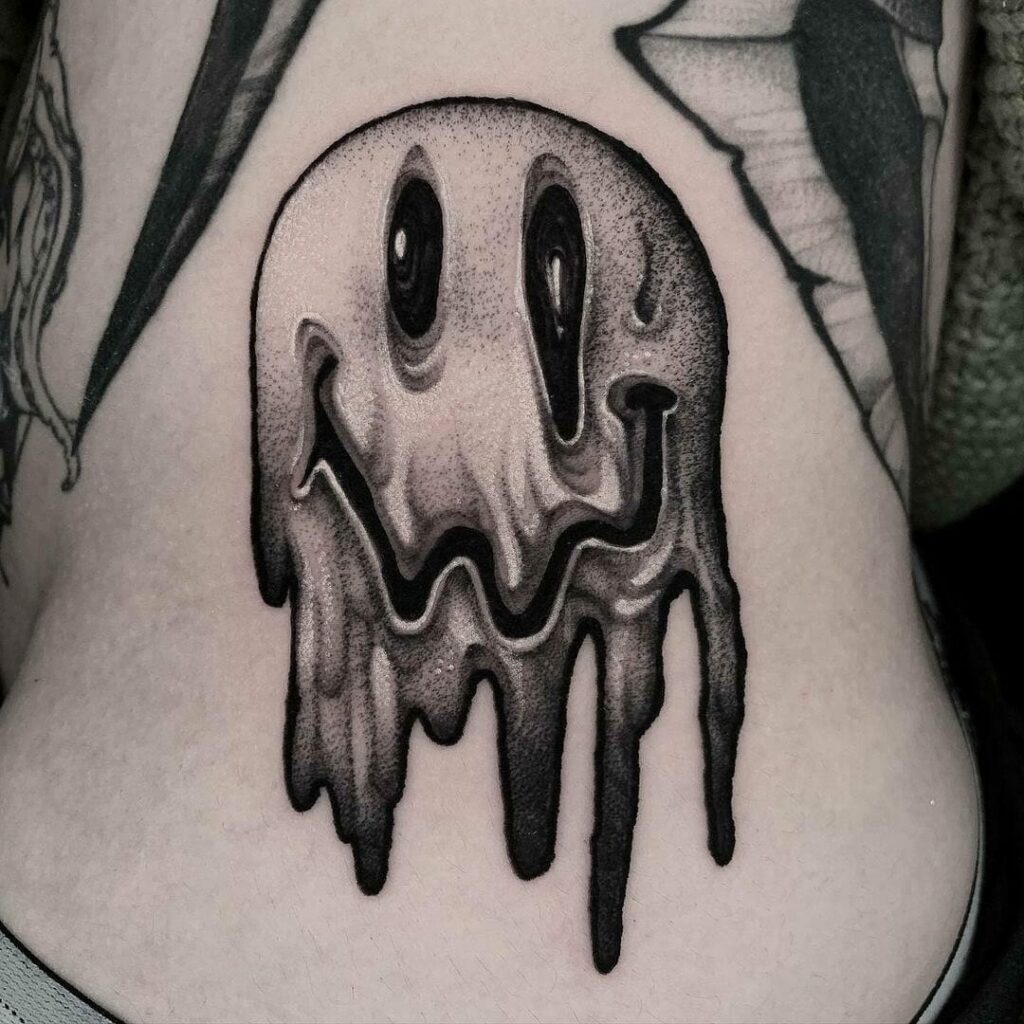 Tattoo of A Smiley Face melting