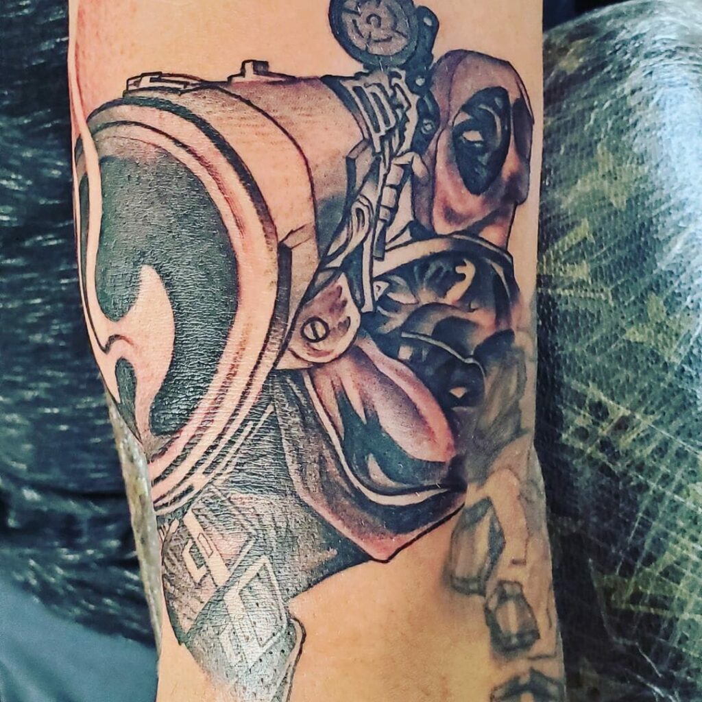 The Badass Deadpool Holding A Rocket Launcher Tattoo
