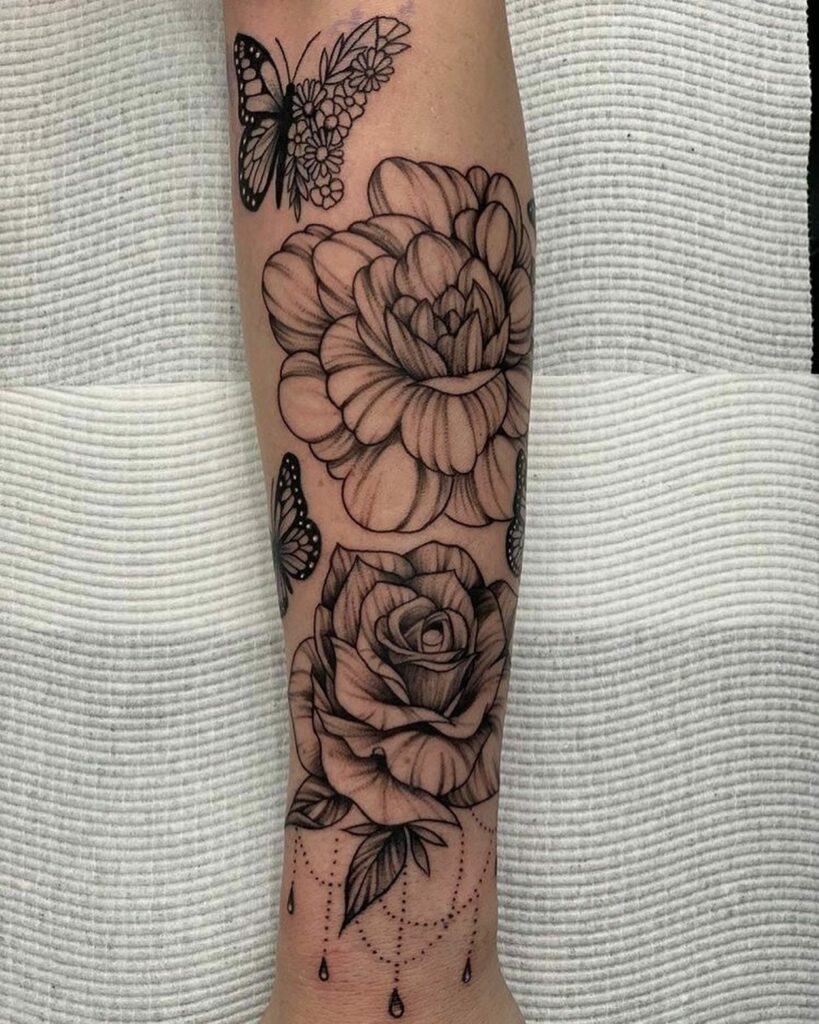 The Bold Fineline Rose and Marigold Tattoo
