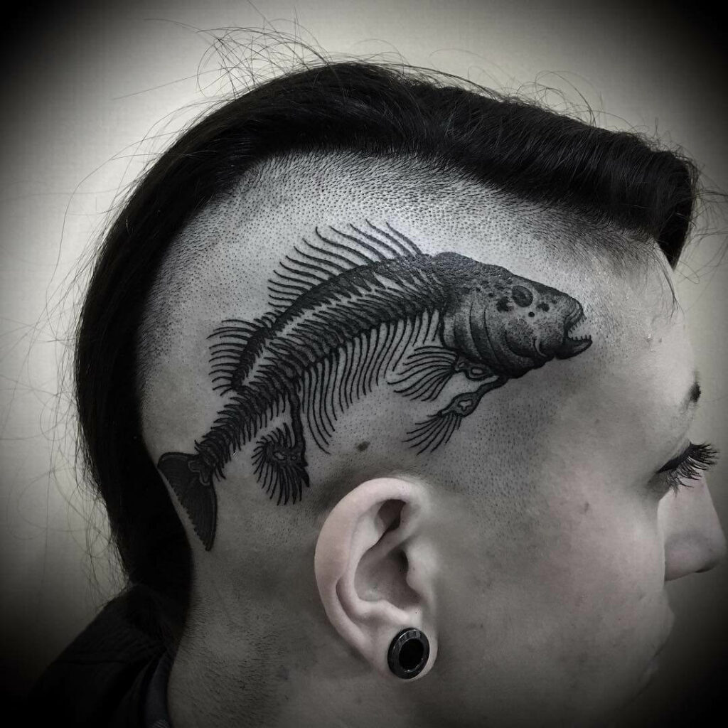 The Striking Fish Skeleton Head Tattoo