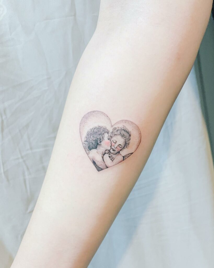 The Two Children Tattoo In A Heart