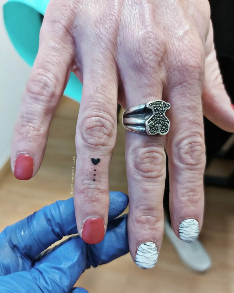 Tiny Heart Finger Tattoos