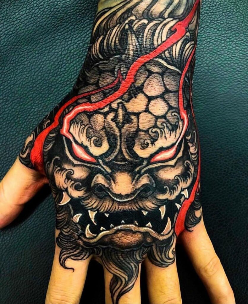 Colorful Foo Dog on Hand Tattoo Idea