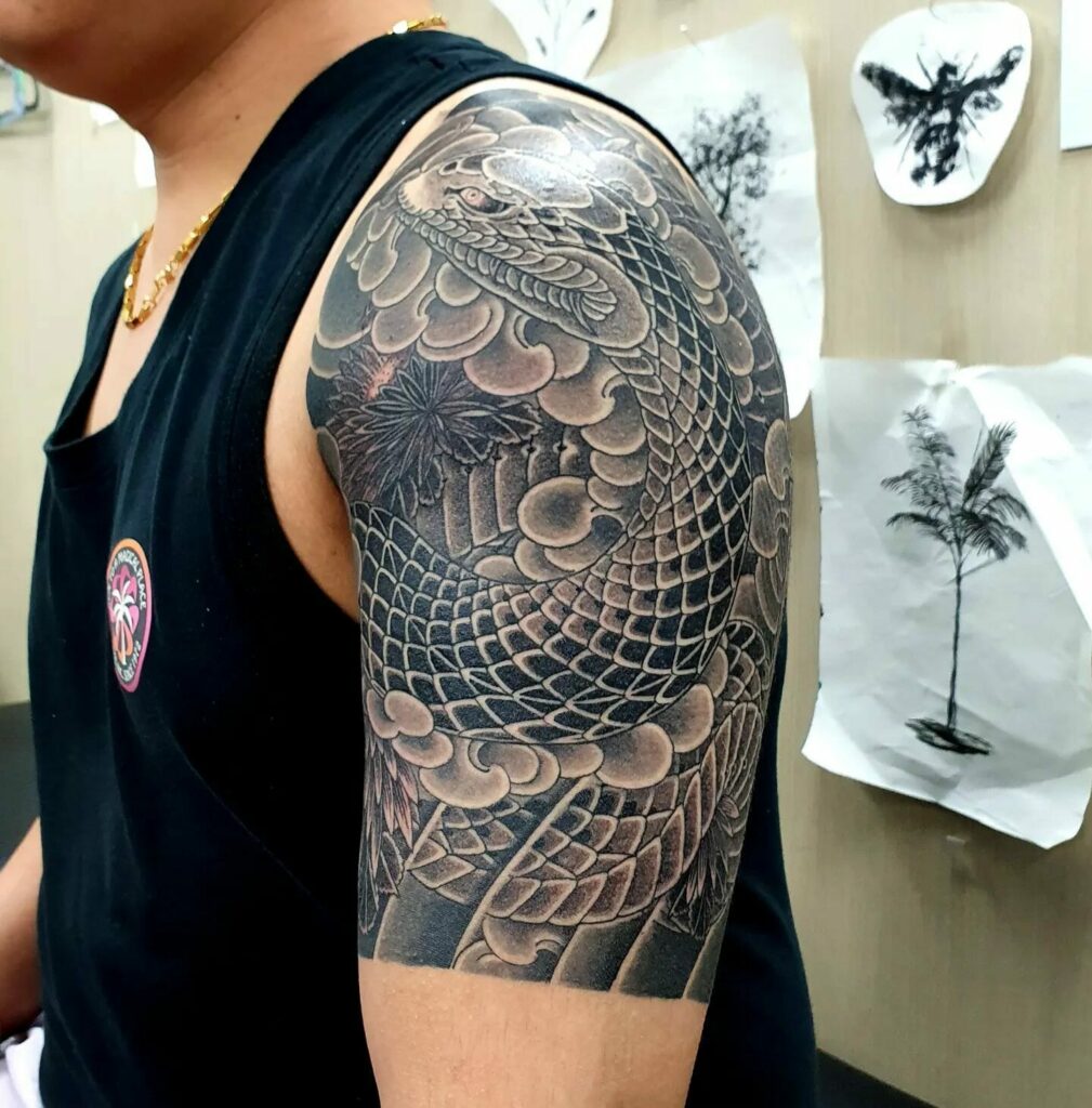 blackwork dotwork snake sleeve by Halley Mason TattooNOW