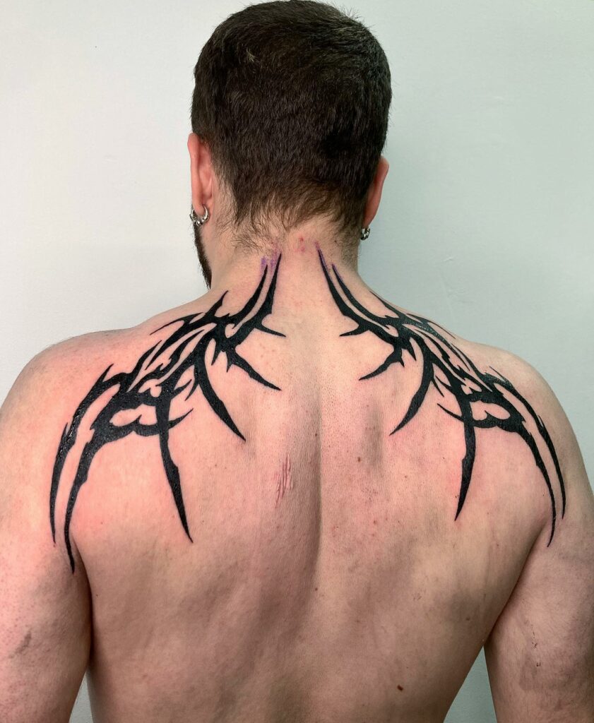 Tattoo uploaded by Blane Hays  Arrow spine tribal shapes blackandgrey   Tattoodo