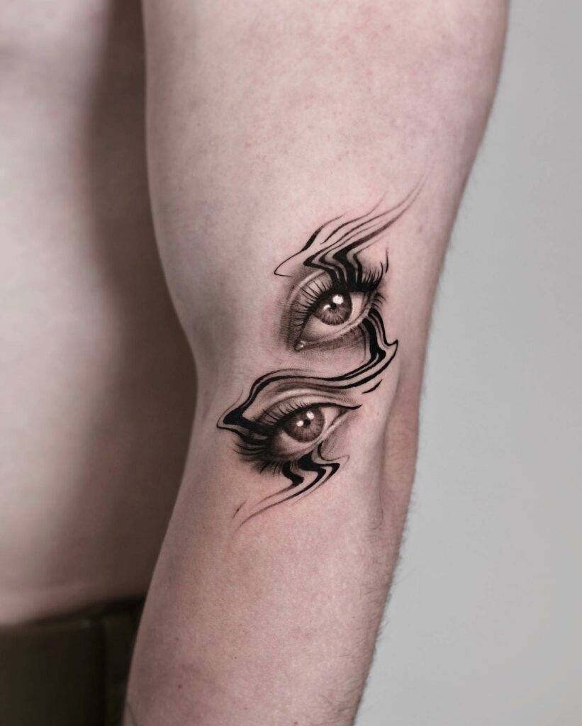 Two Eye Tattoos On Arm