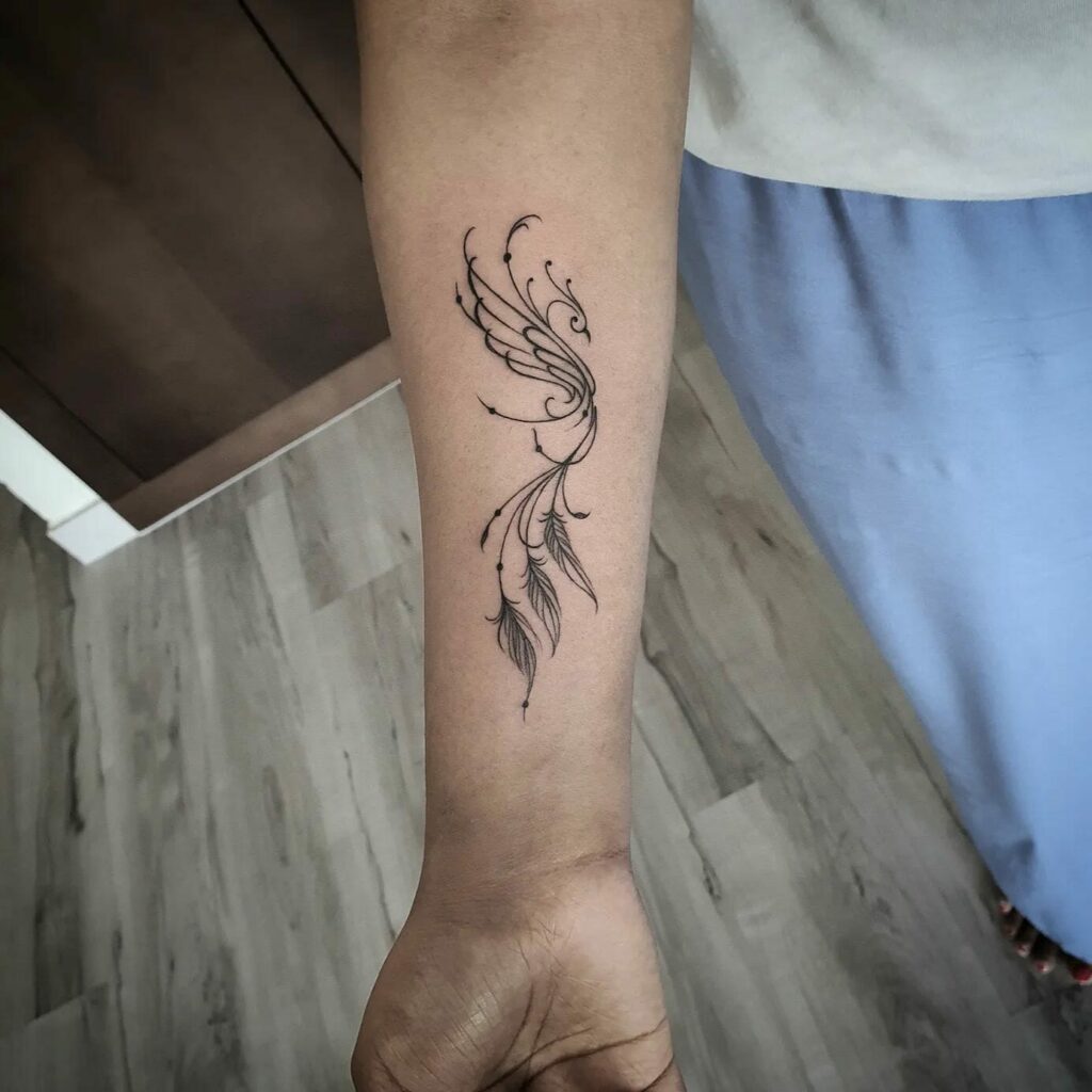 delicate phoenix tattoo