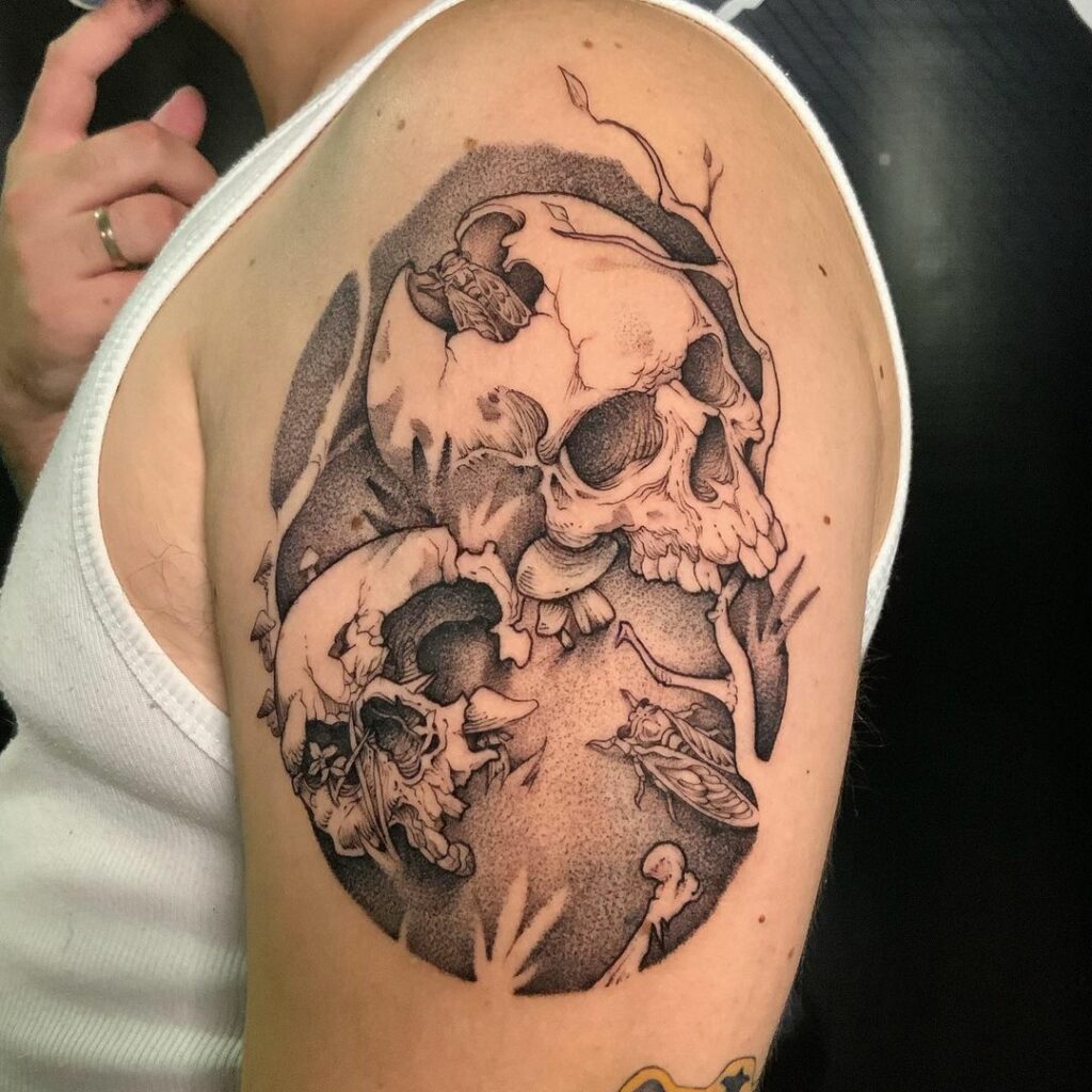 Unique Skull And Cicada Forearm Tattoo