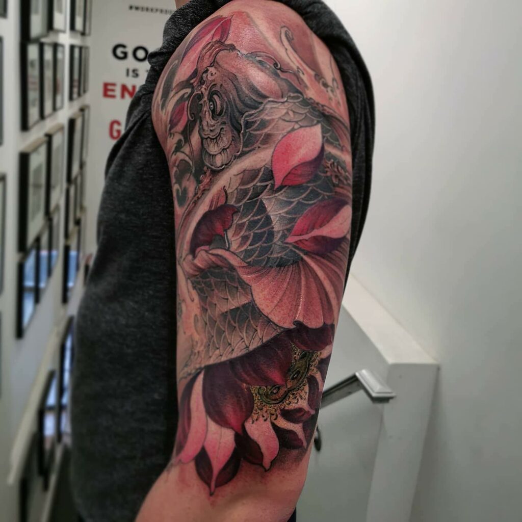 Unique Upper Arm Half Sleeve Tattoo