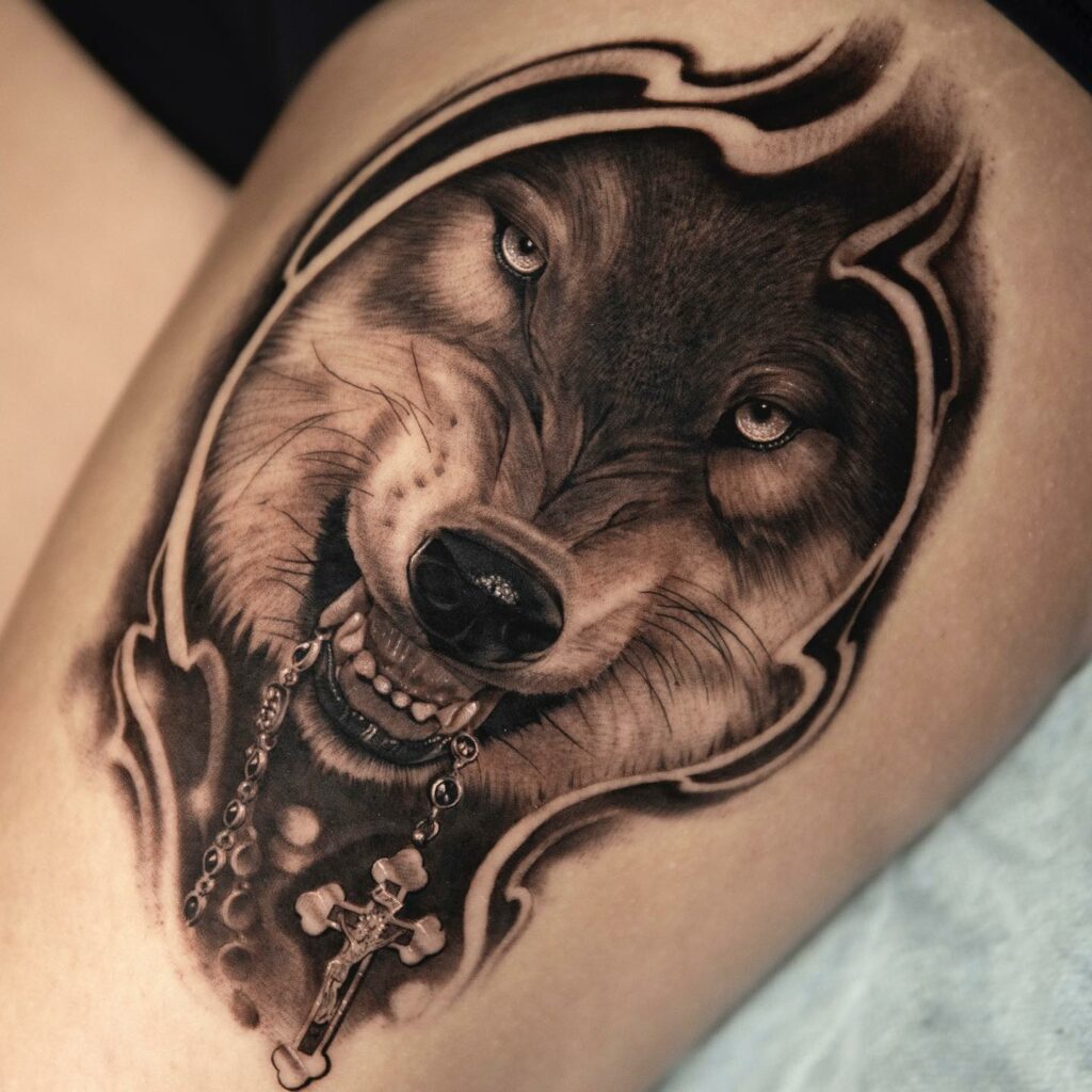 Wolf Biting A Traditional Rosary Bead Tattoos
