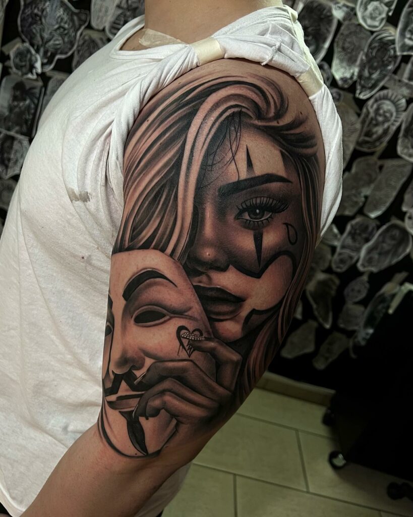 Woman and Dali Mask Arm Tattoo