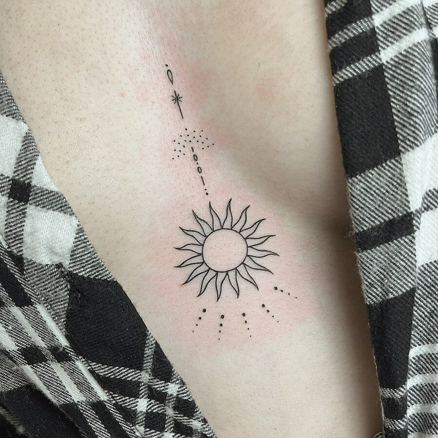 Wonderful Sternum Tattoo Design With Sun And Moon Motif