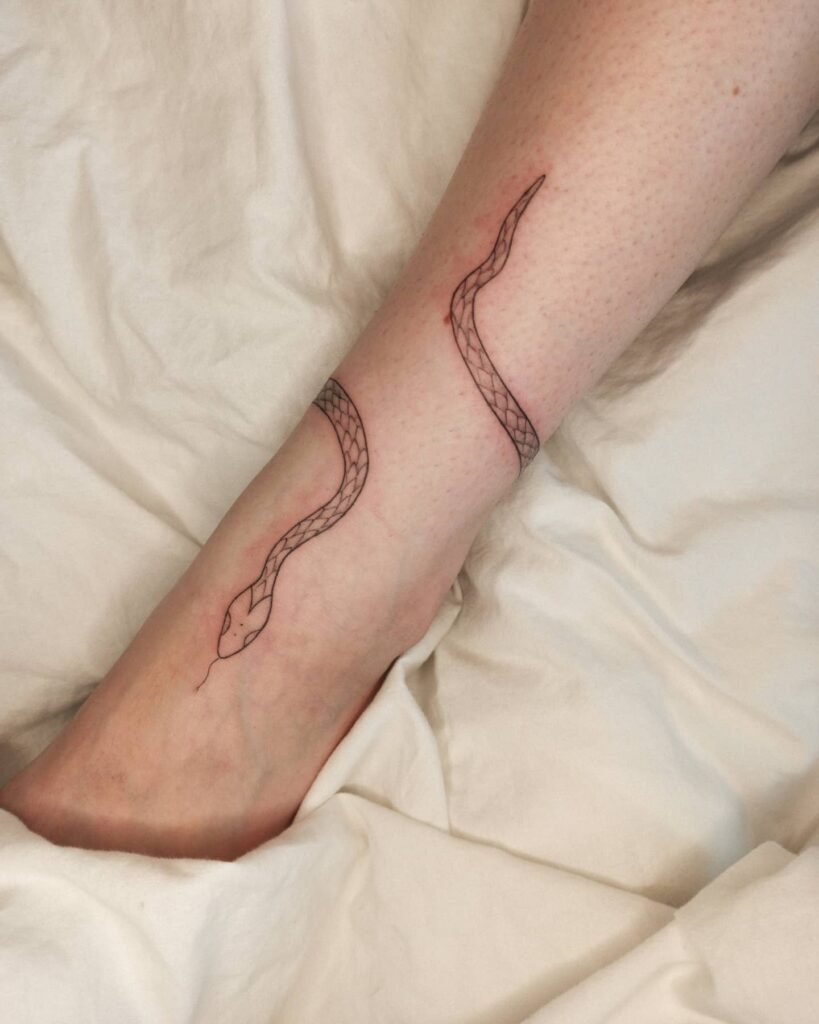 Wrap Around Snake Ankle Tattoo