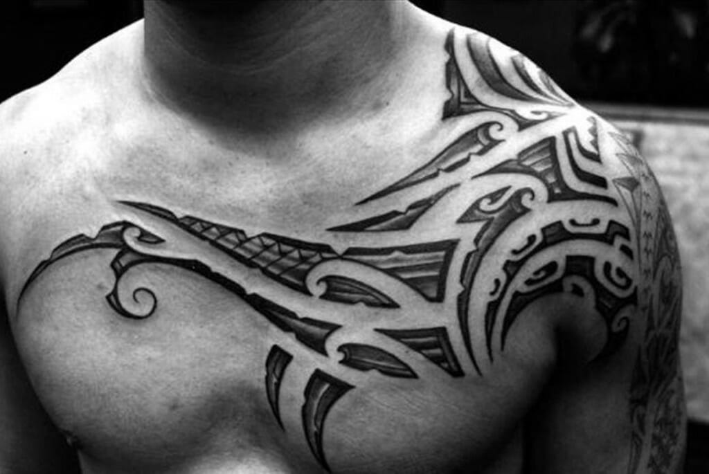 Half Tribal Chest Tattoo