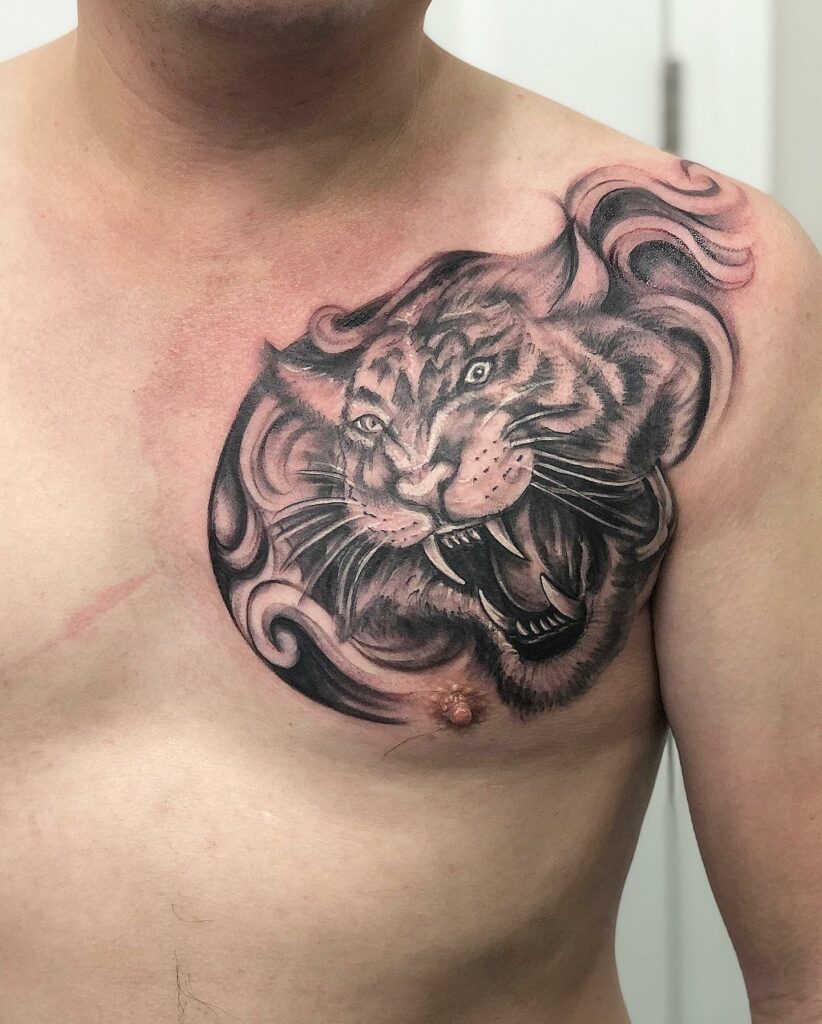 Bright and Noticeable Male Chest Tattoos with a Tiger