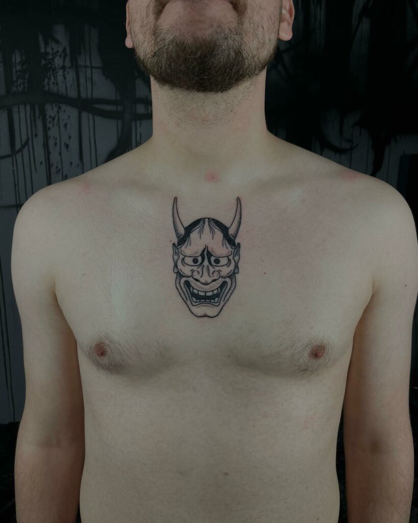 japanese mask tattoos chest