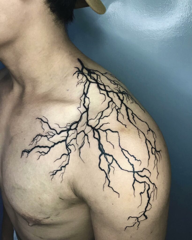 Tattoo uploaded by Sir Stone  Zeus hurling his thunderbolt emerges from  within a twisted dead tree Black and gray white ink accents and a light  teal to make the lightning glow