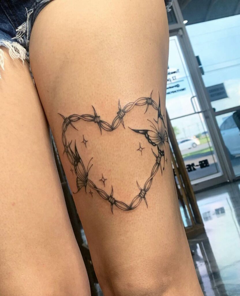 Barbed wire butterfly tattoo