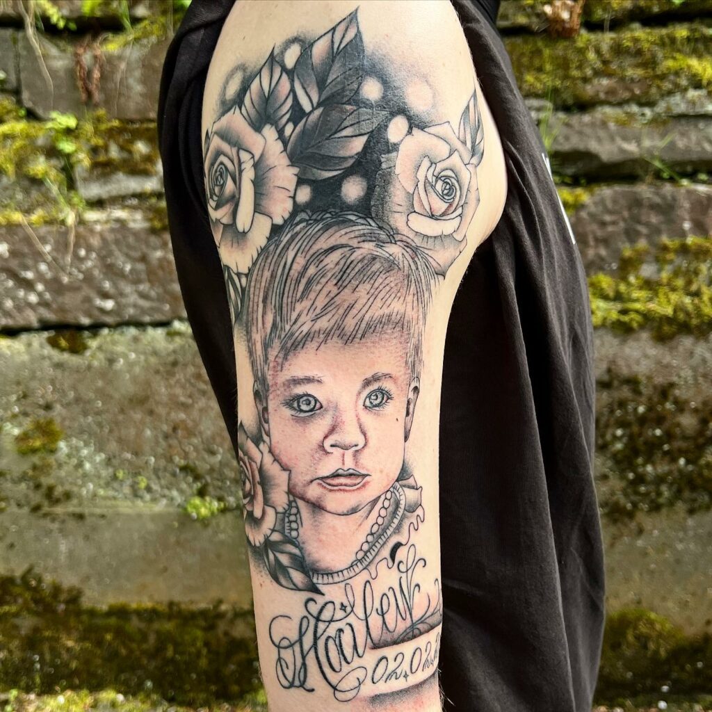 Detailed Upper Arm Tattoo