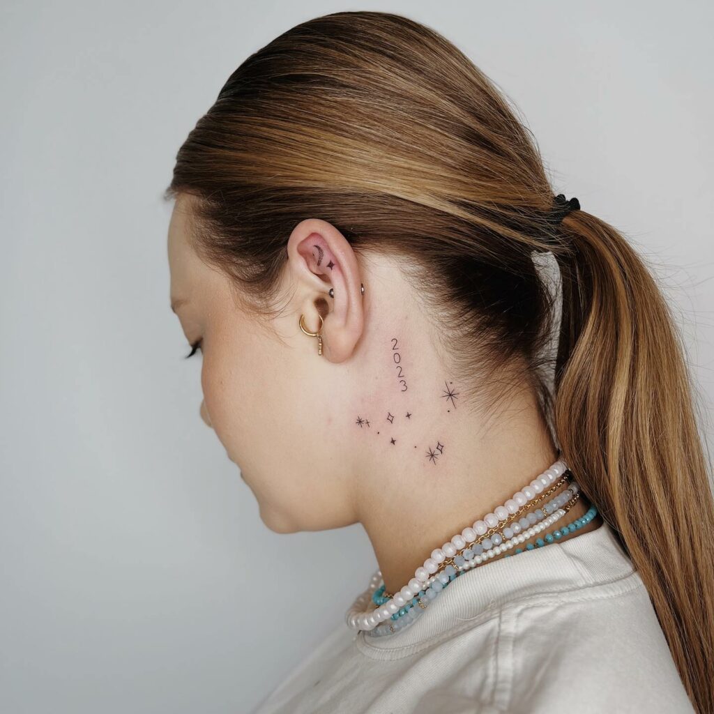 Star neck tattoo