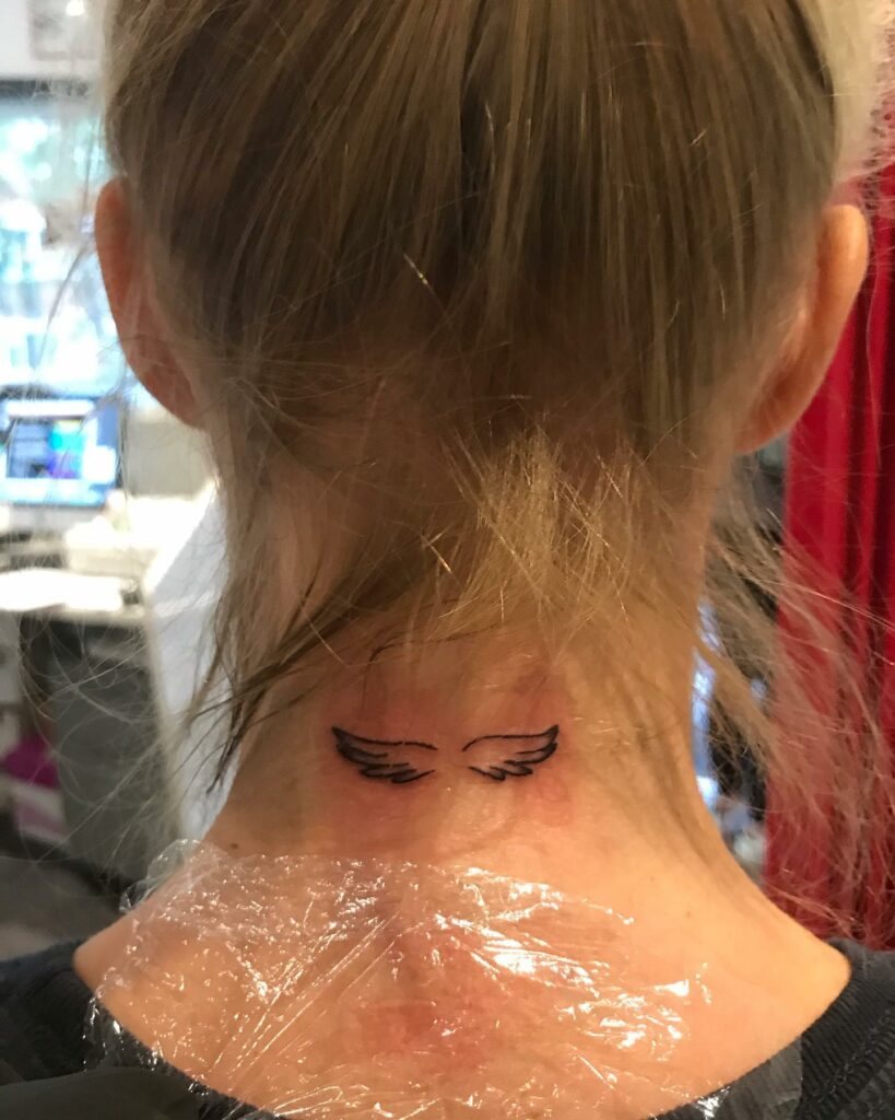 Wings neck tattoo