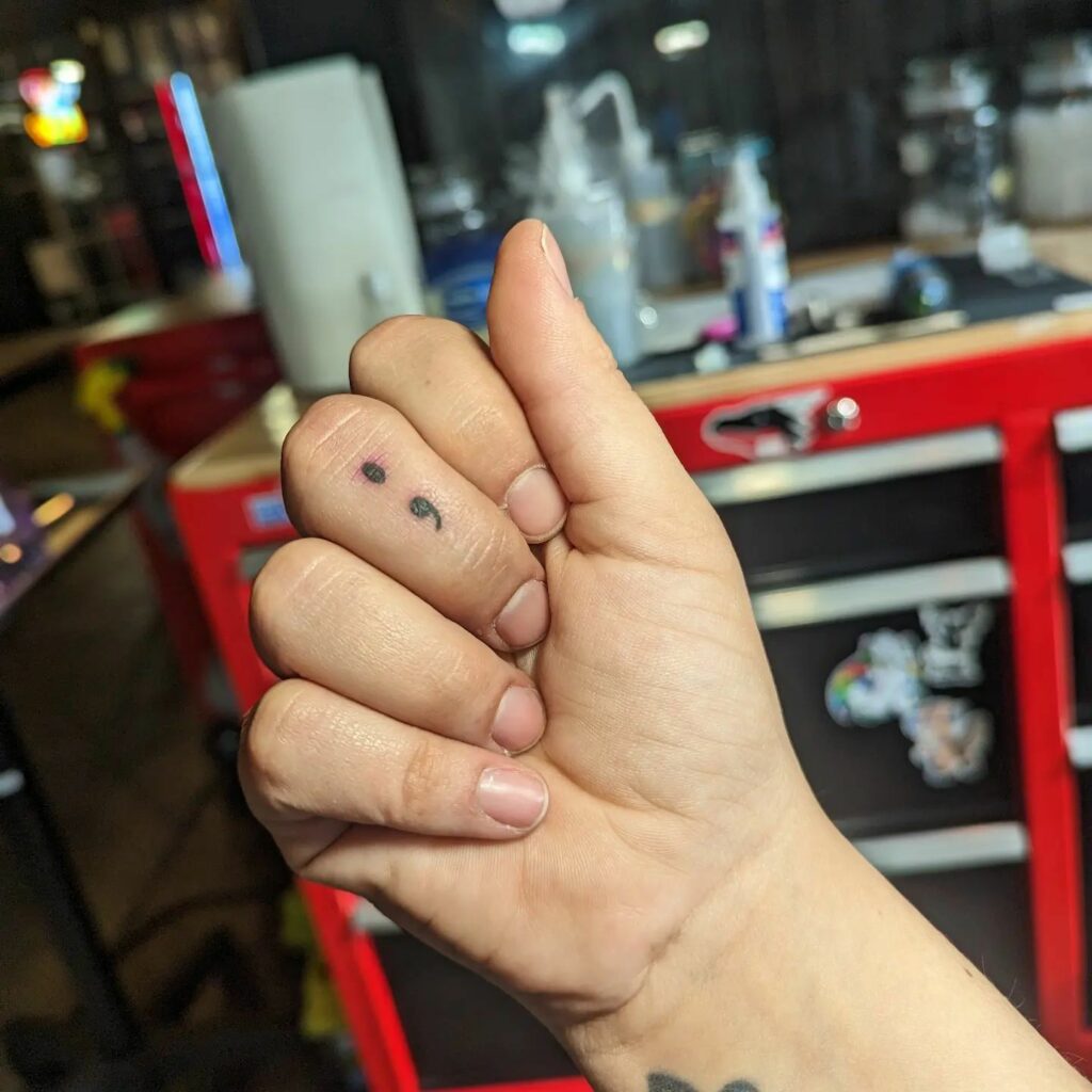 Semicolon Finger Tattoo