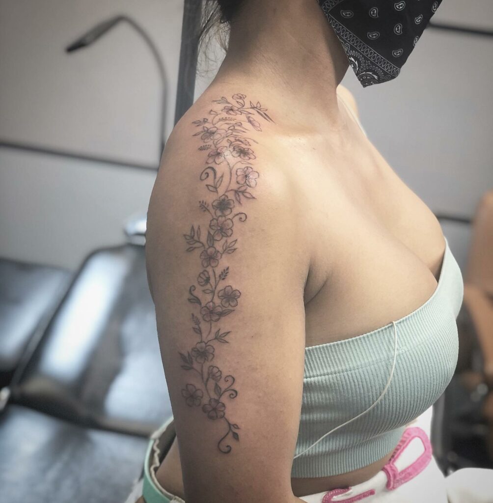 Shoulder and Arm Tattoo
