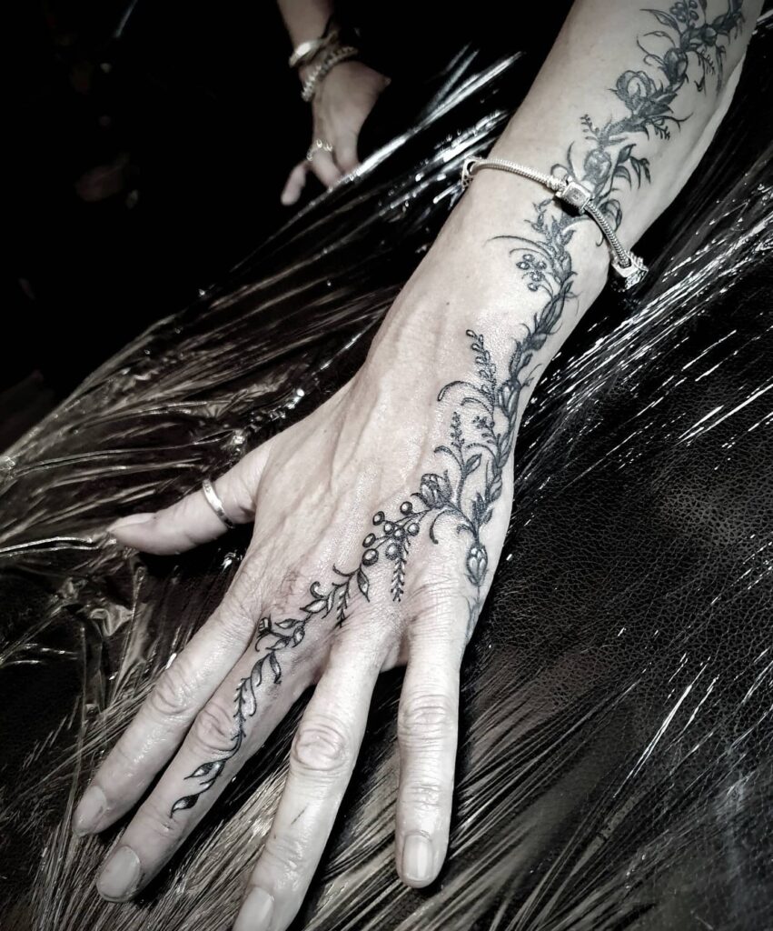 Hand and Finger Tattoo