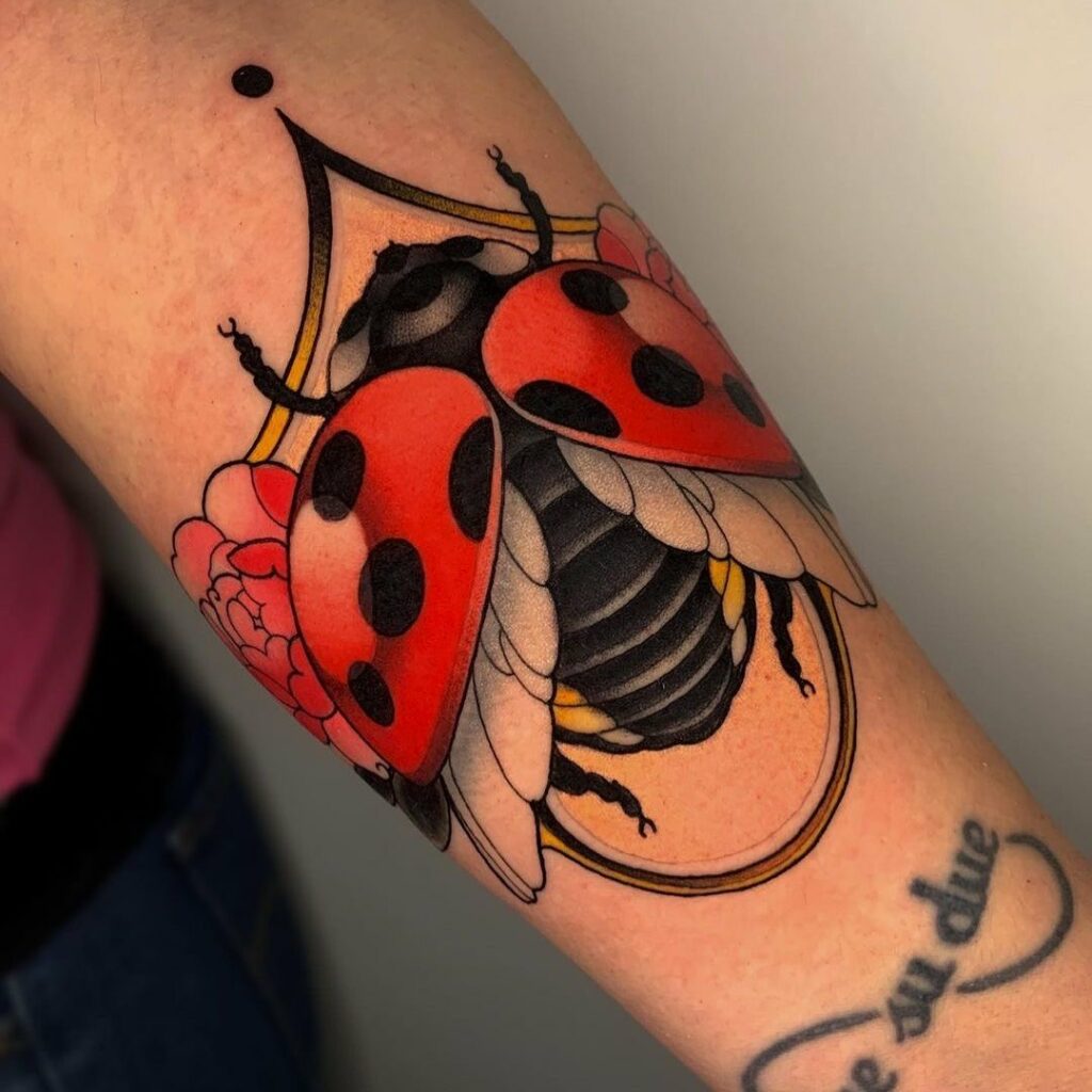 Neotraditional ladybug tattoo