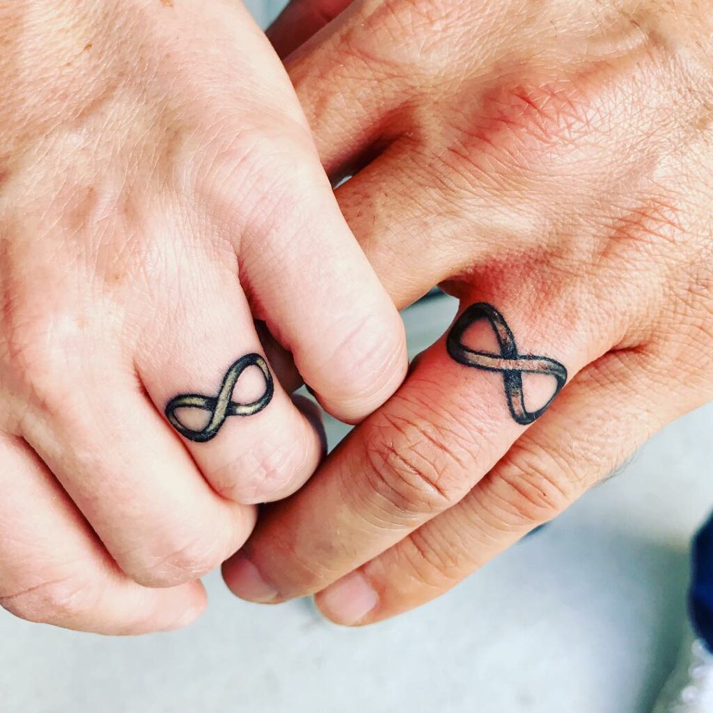 Infinity Traditional Wedding Ring Tattoo