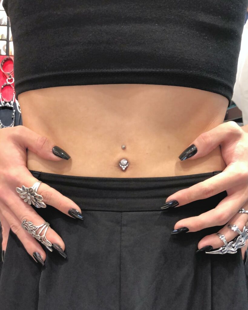 How often should i clean my belly hot sale button piercing