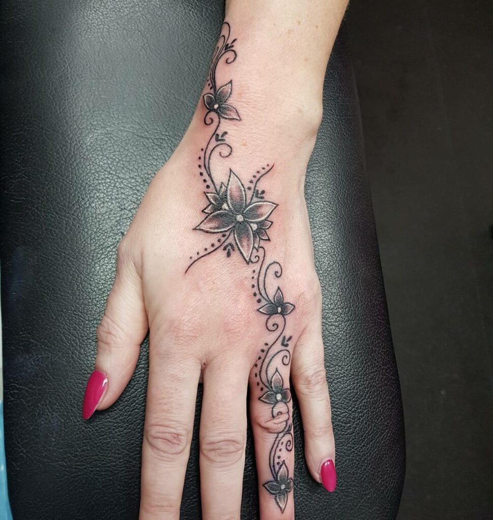 Hand and Finger Tattoo