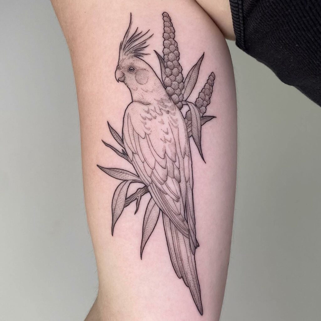 One line parrot tattoo on the wrist