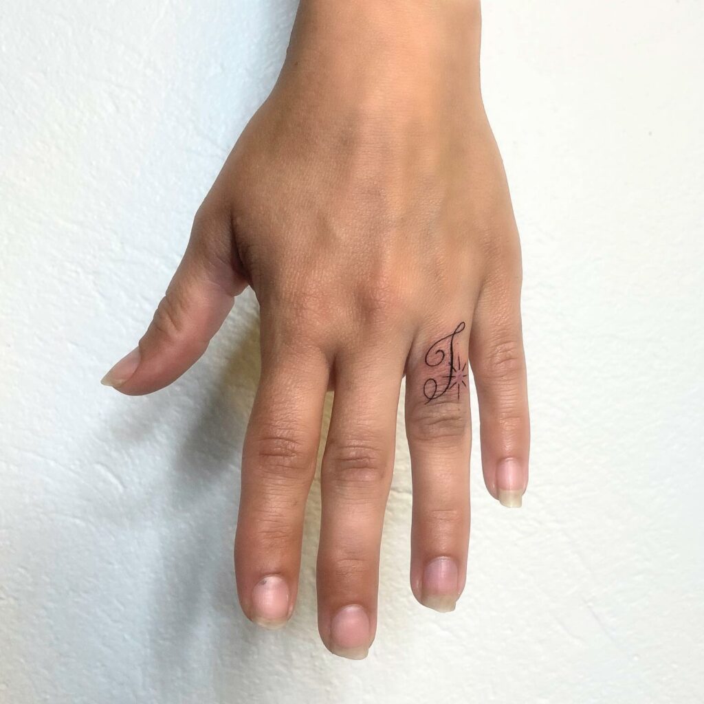  Script Ring Tattoo Designs