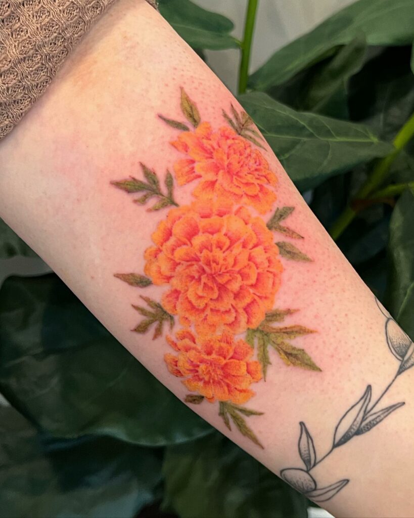 cosmos and marigolds tattoo ideasTikTok Search