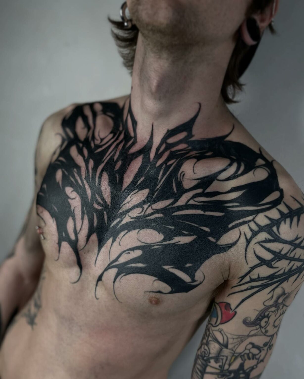 chest-tattoo-pain-how-bad-is-it-how-to-reduce-it-in-2024