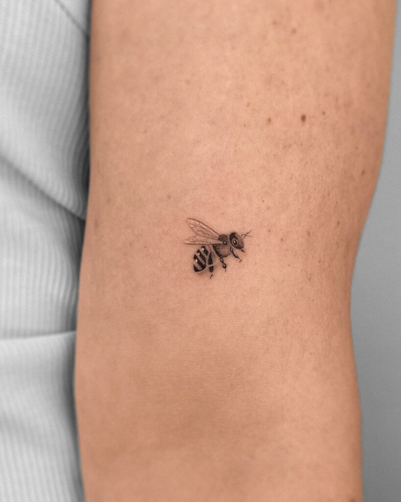 Minimalistic Bee Tattoo