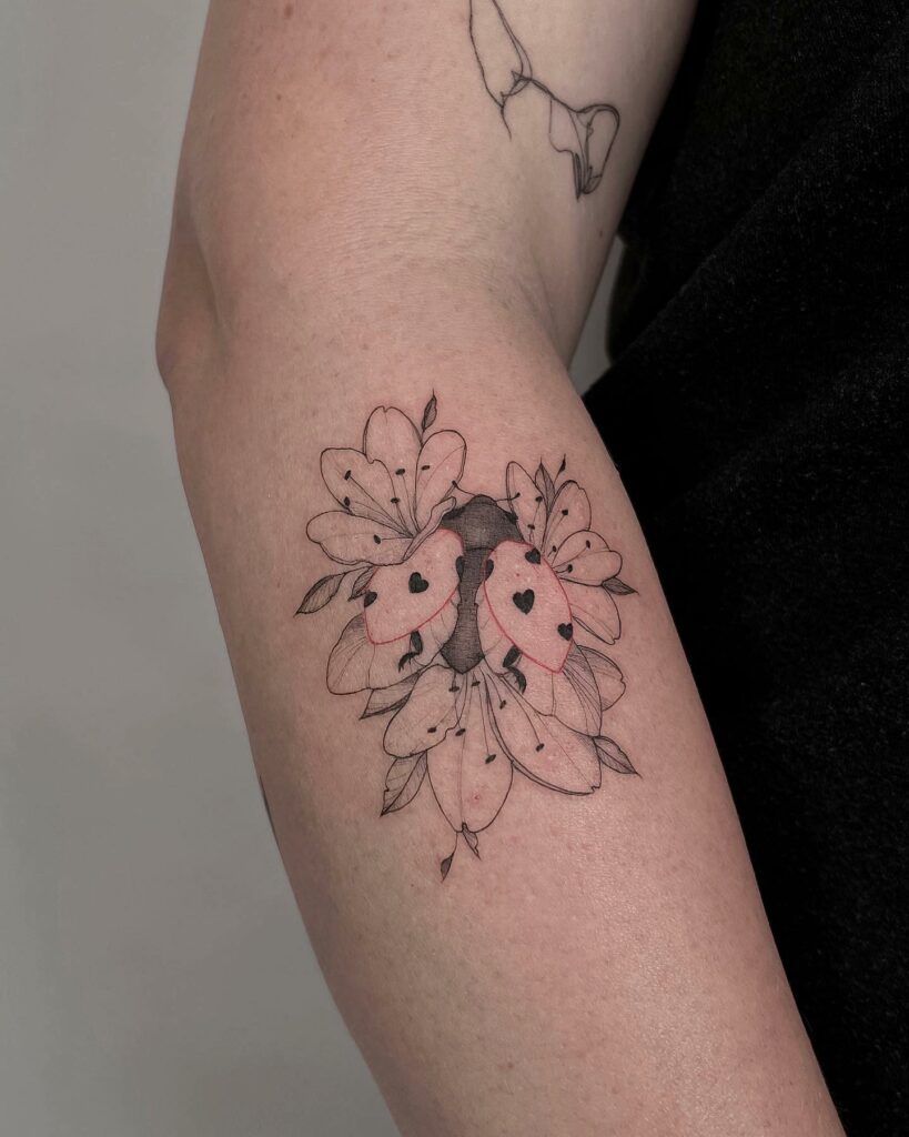 Floral Ladybug Tattoo